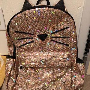 JUSTICE gold backpack